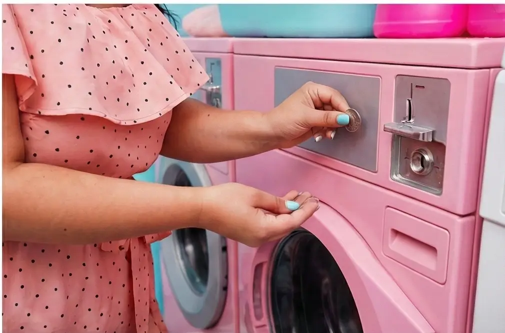 Put Coin In Pink Washing Machine